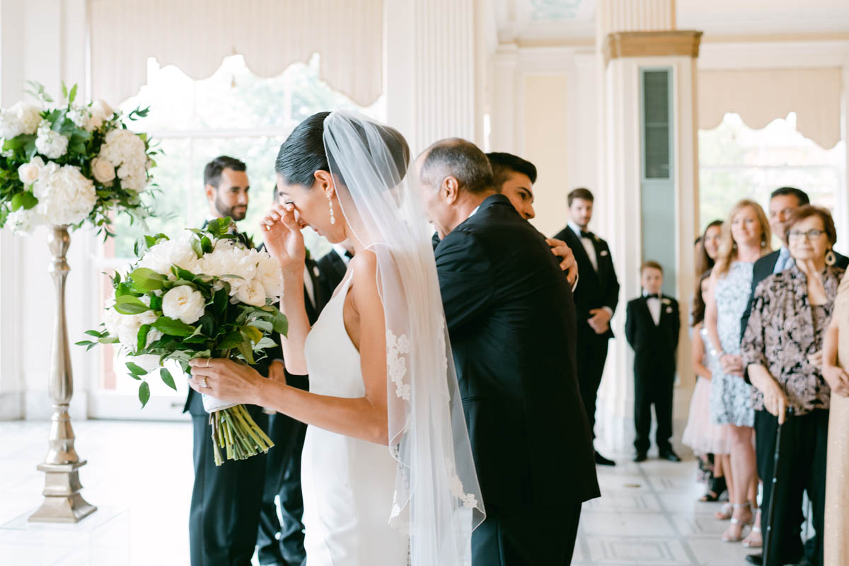 Bride walking down the aisle at South Shore Cultural Center wedding.