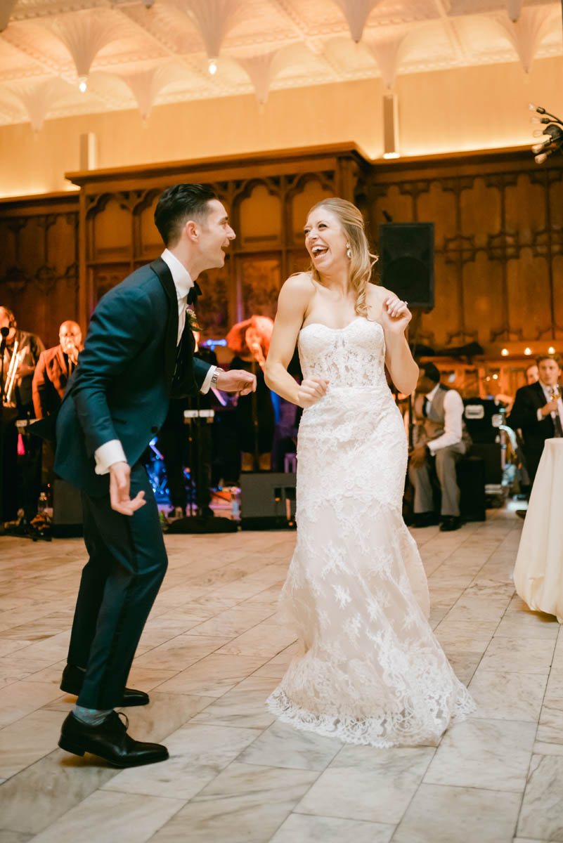 Bride & groom dancing.