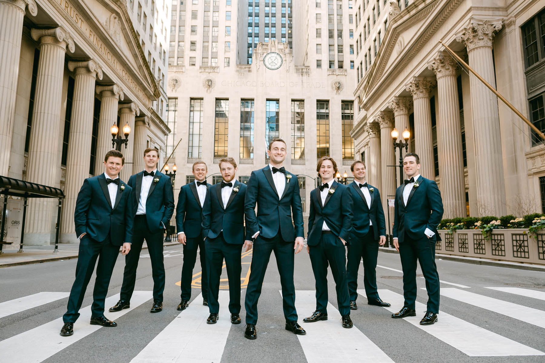 Groomsmen pose for photos at Chicago Board of Trade Wedding