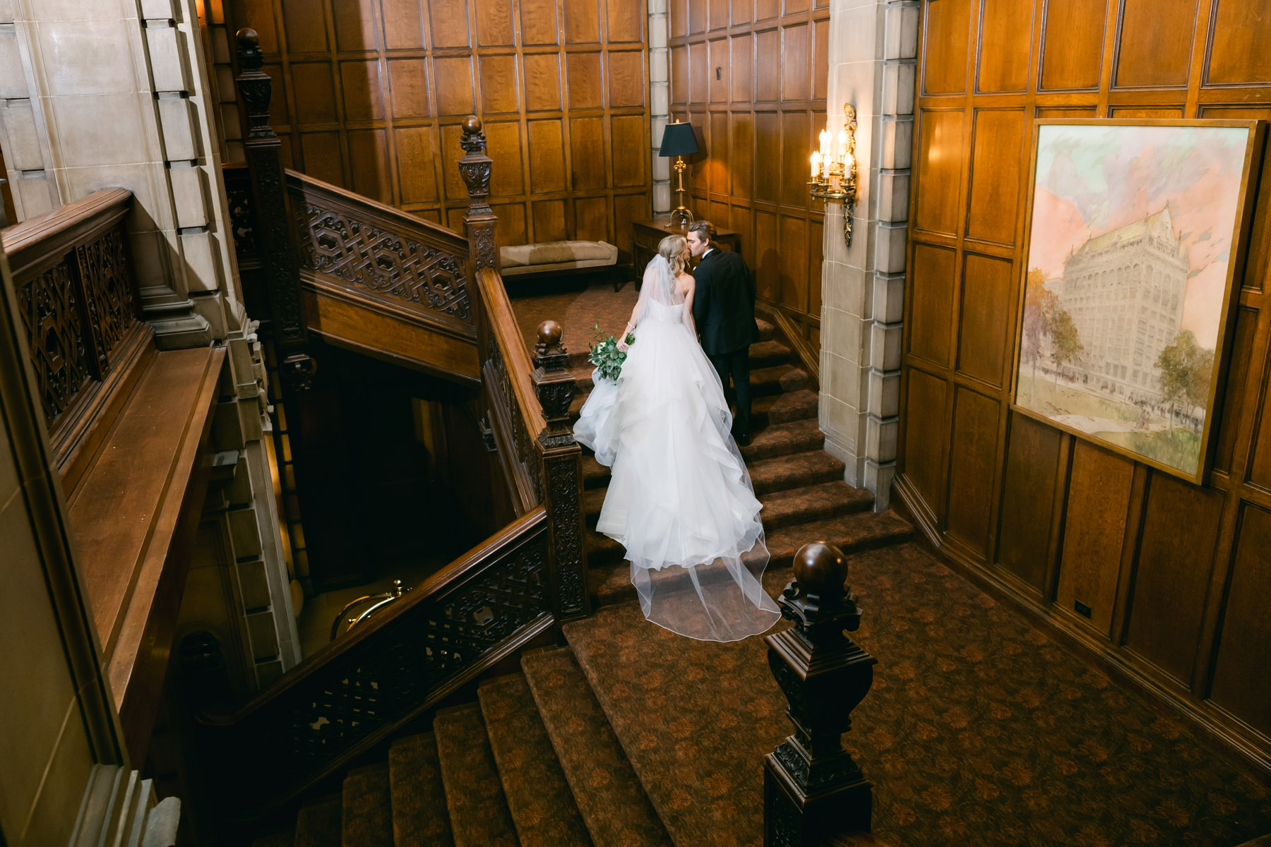 Couple posing for wedding photos at the University Club of Chicago Wedding