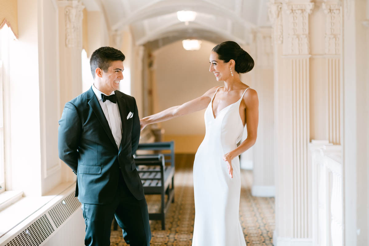 Wedding couple first look at South Shore Cultural Center wedding.