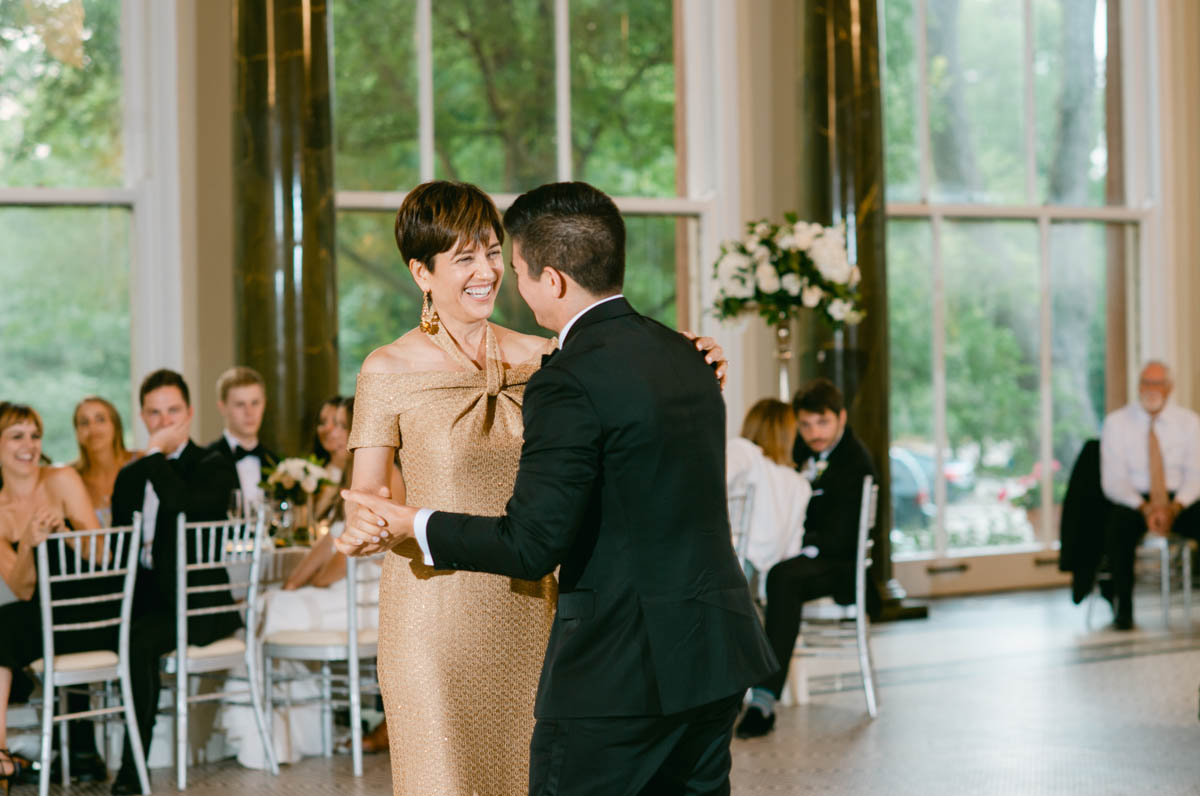 Groom dancing with his mom at South Shore Cultural Center wedding.