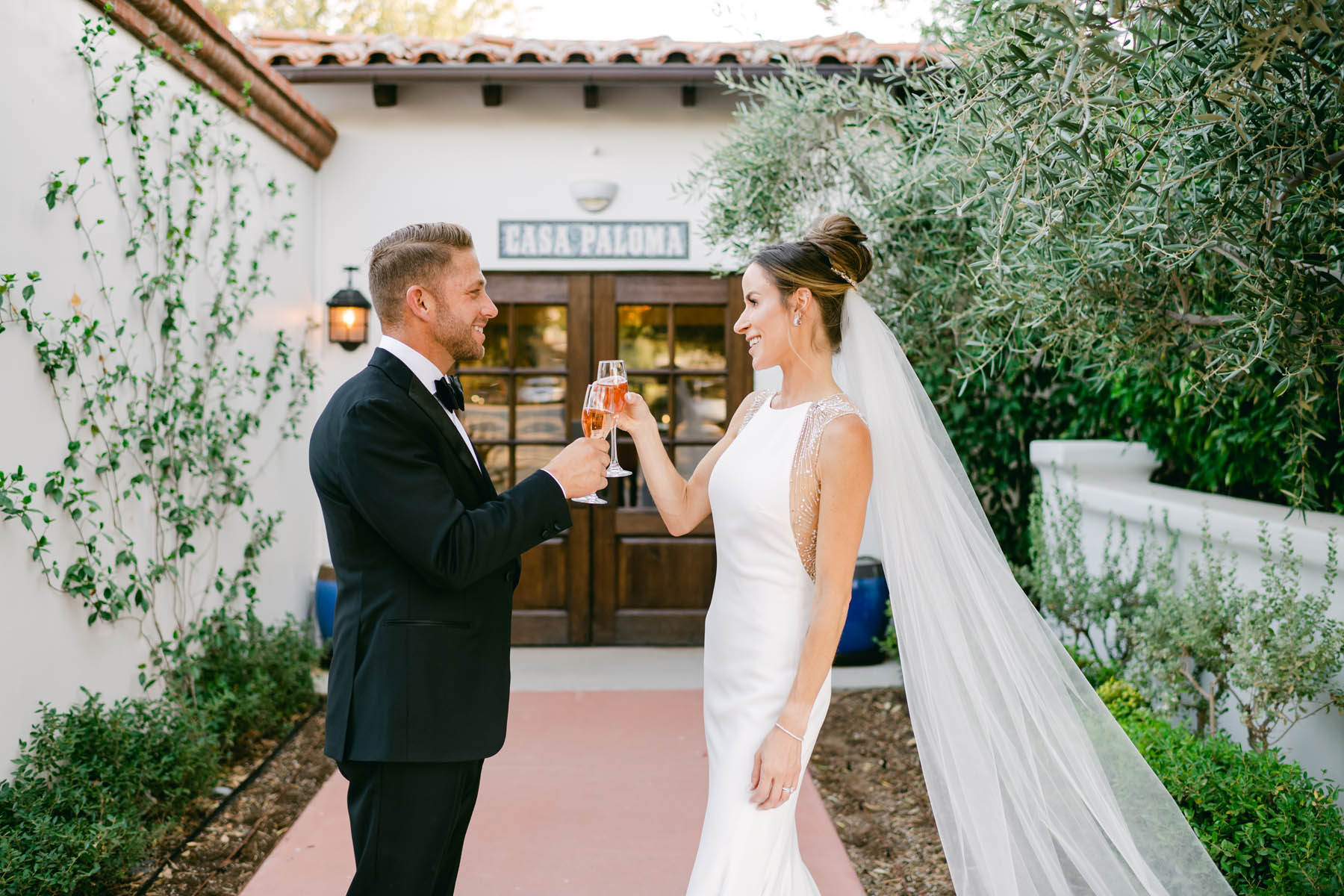 Wedding couple toasting at their Scottsdale wedding.