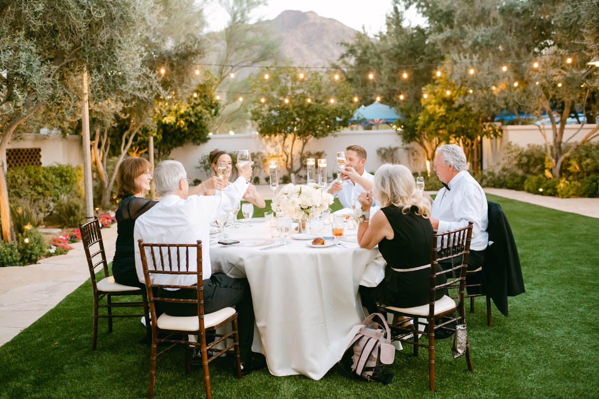 Wedding guests toasting at small reception in Scottsdale.