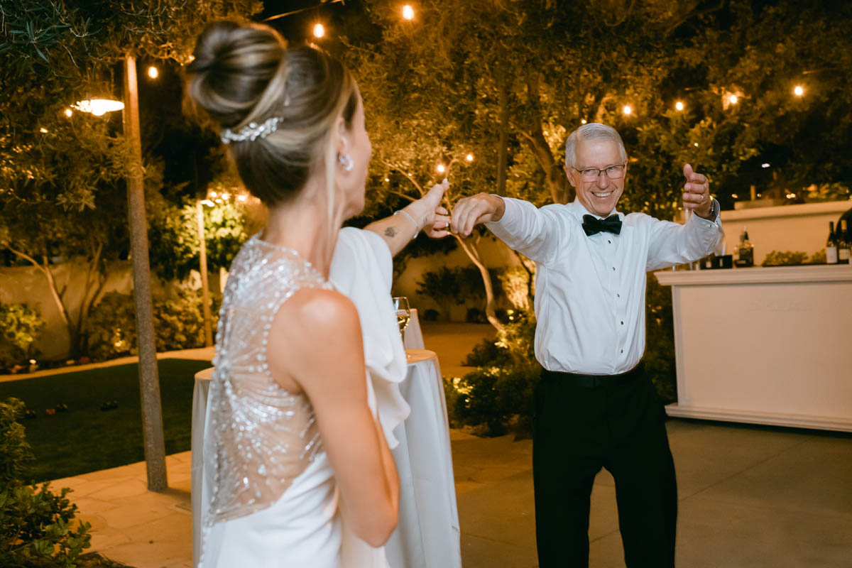 Father and daughter dance.