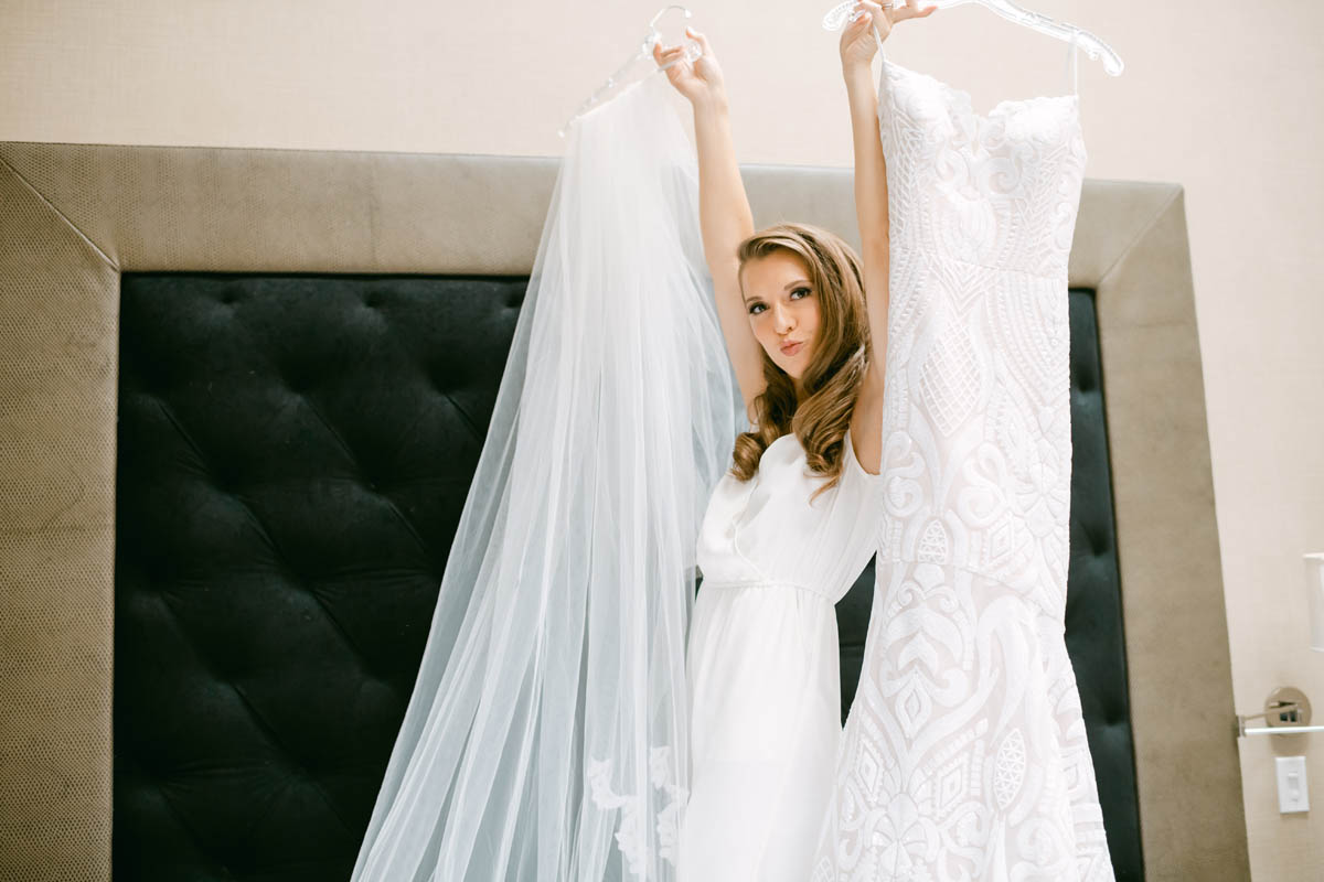 Bride white pajamas with her wedding dress.