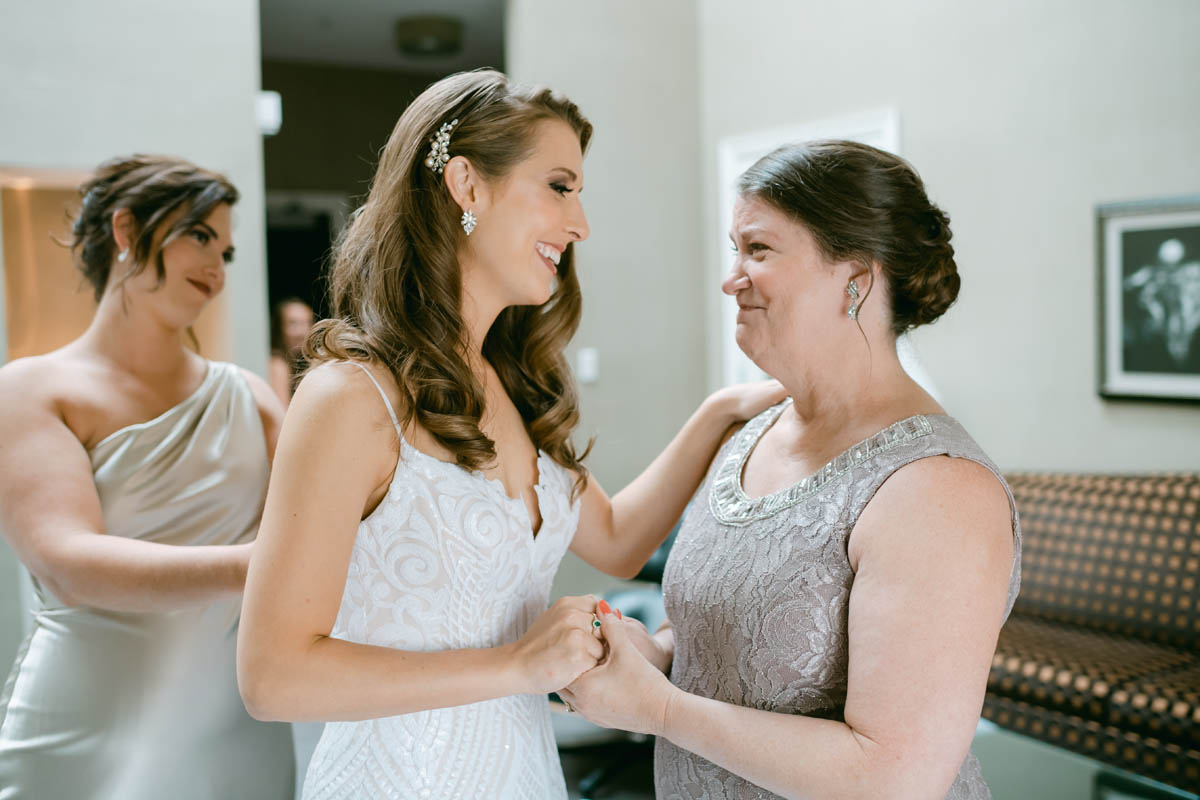 Sweet moment with bride and mom.