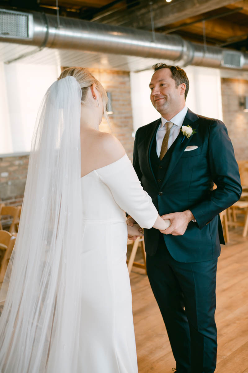 Groom sees his bride for the first time.