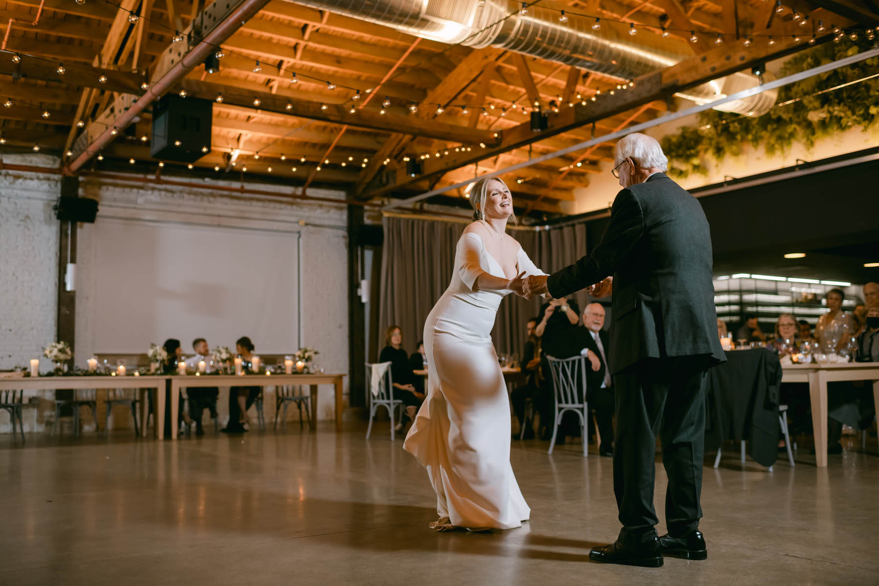 Father dancing with the bride at Walden.
