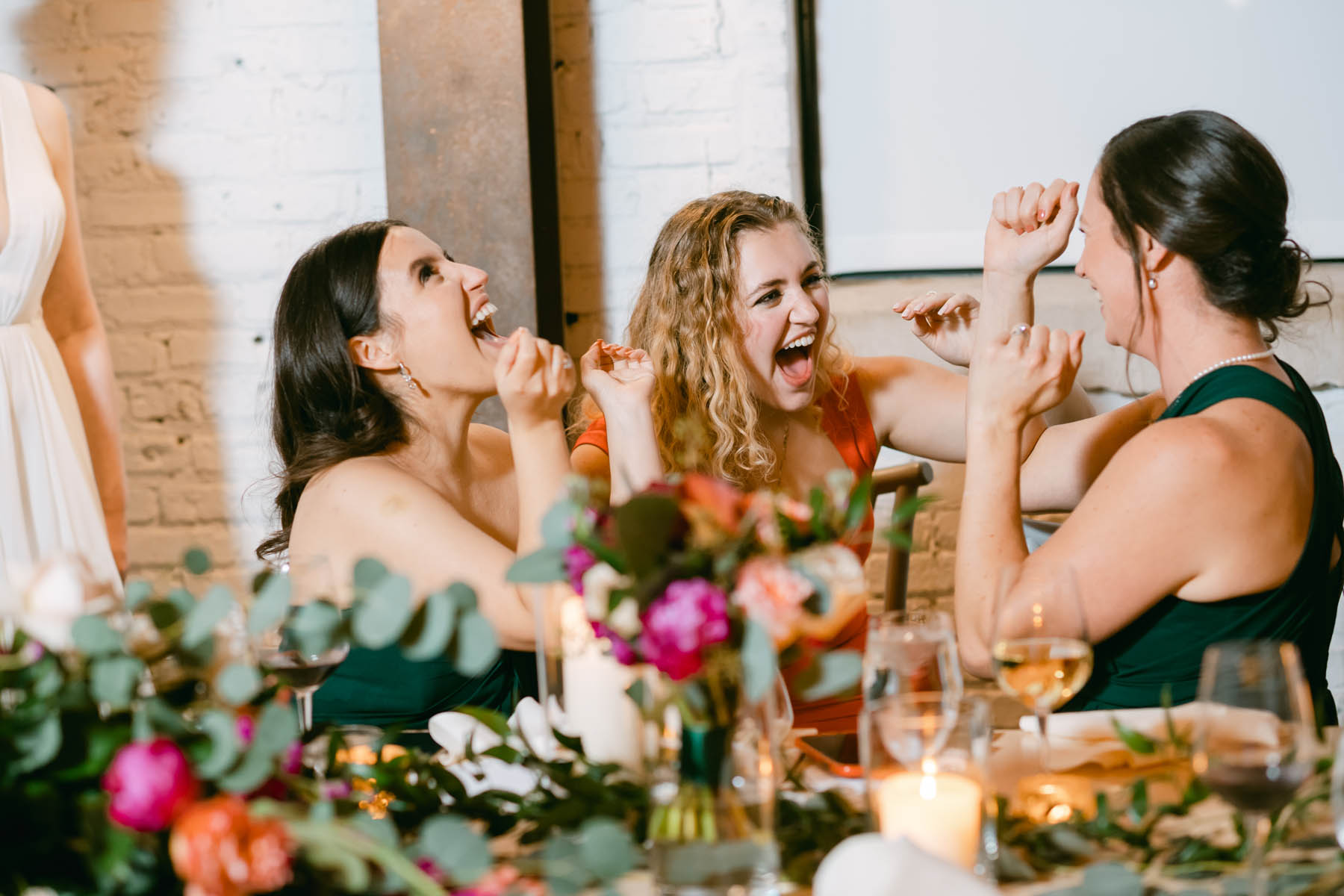 wedding guests laughing