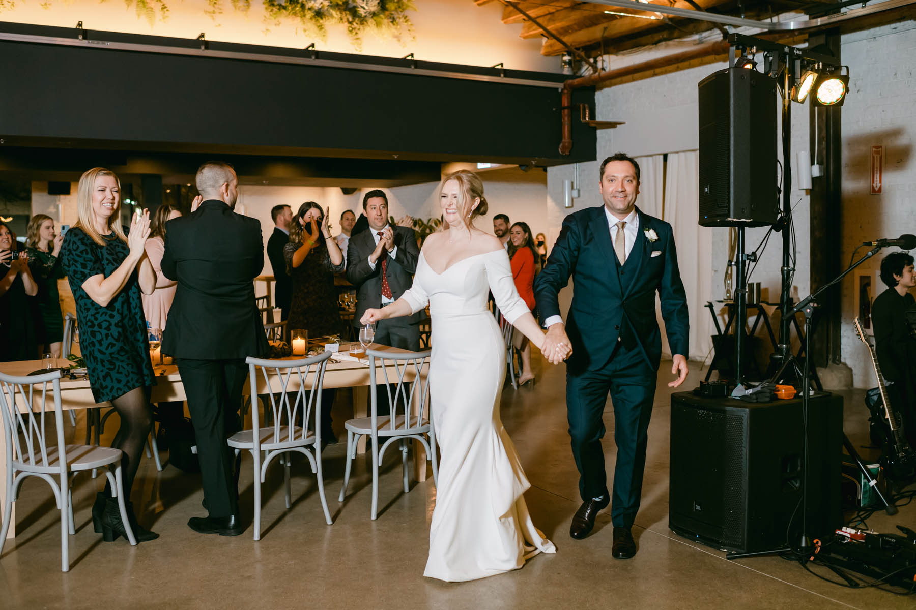 Bride and groom entrance to reception at Walden.