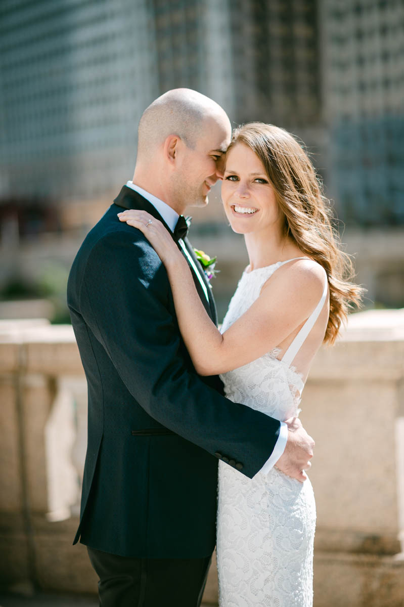 Wedding couple poses for photo at Gibson's Italia wedding.