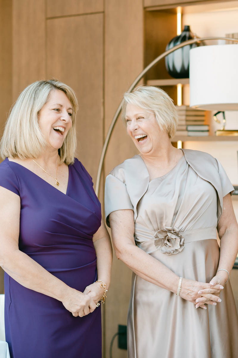Moms laughing together.