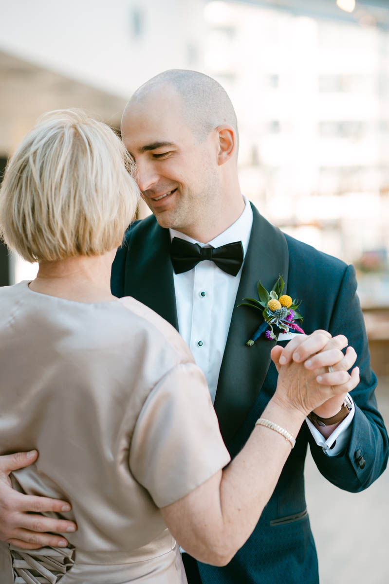 Groom dancing with his mom.