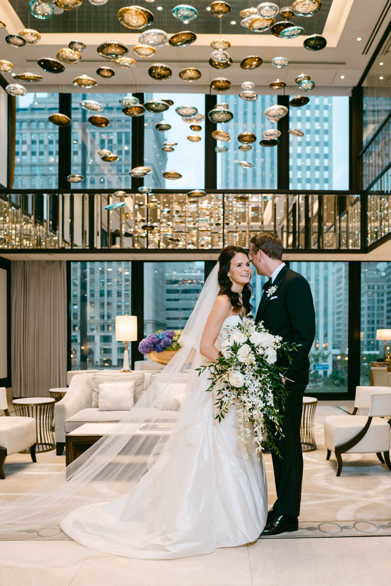 Wedding couple posing at the Langham Hotel wedding.