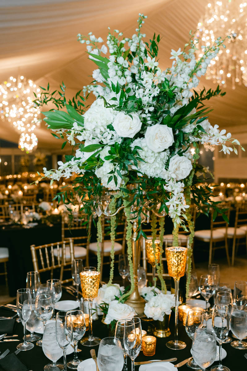 Elegant black and gold reception decor at Galleria Marchetti wedding.