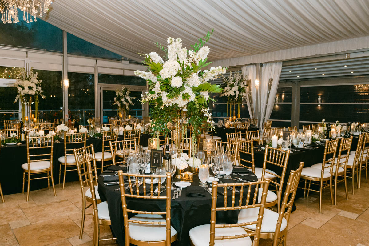 Elegant black and gold reception decor at Galleria Marchetti wedding.