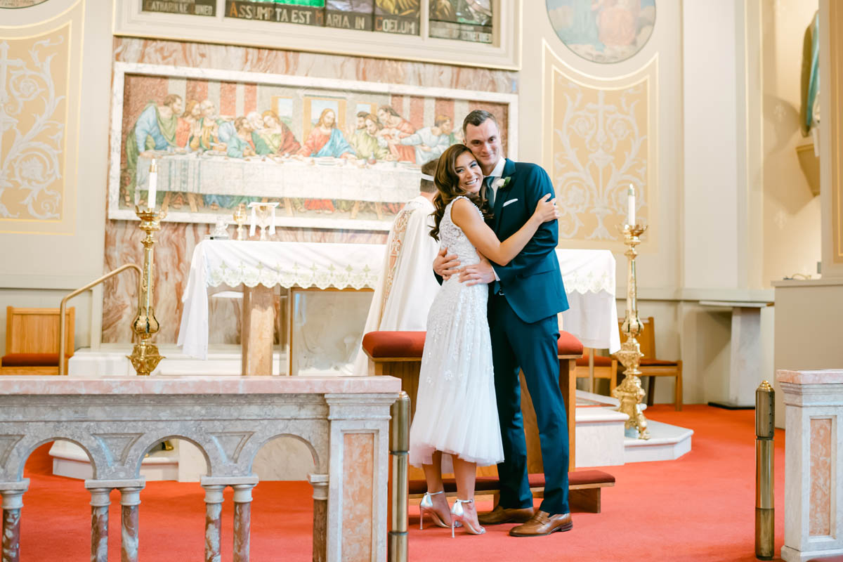 Couple getting married at Assumption Church.