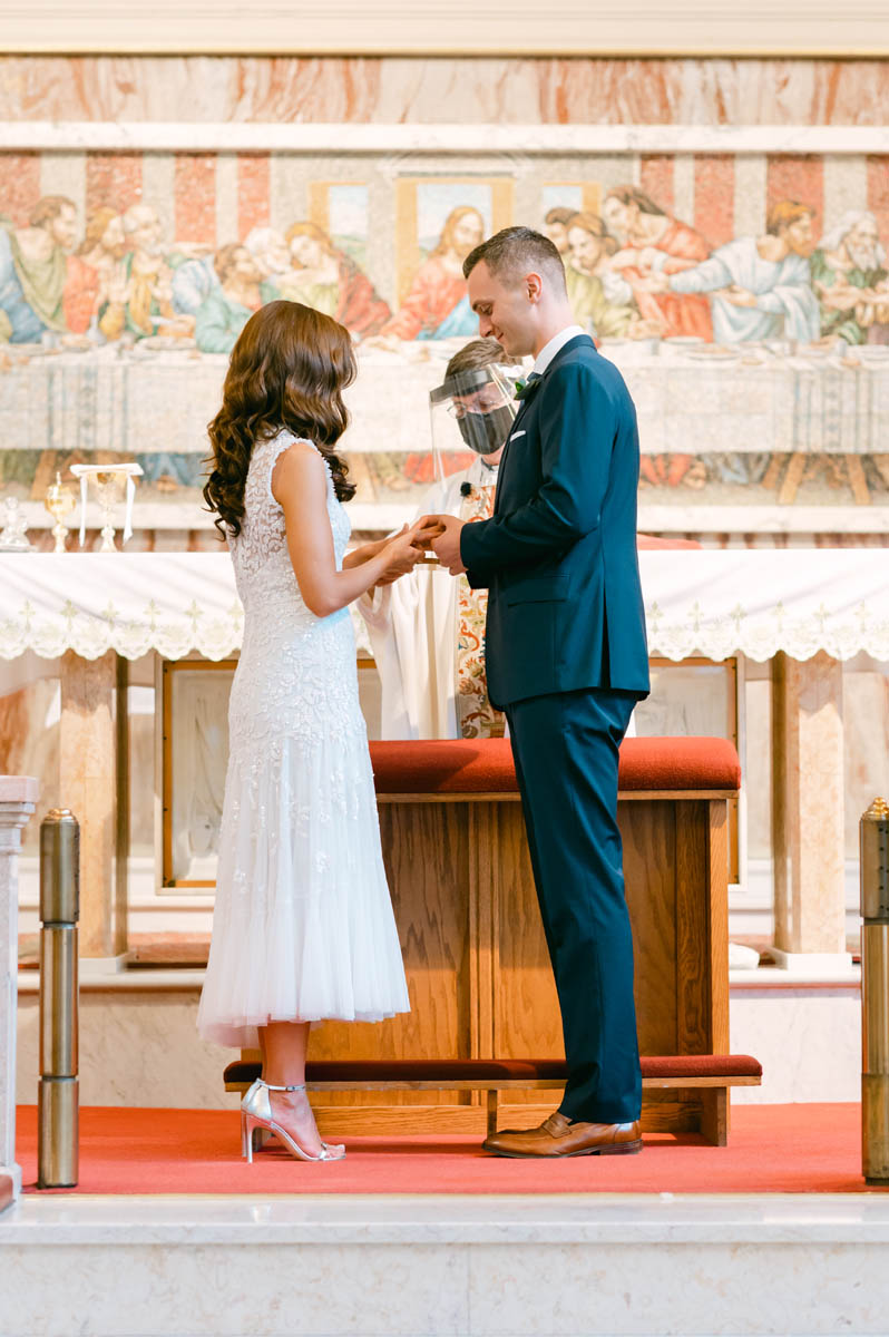 Couple getting married at Assumption Church.