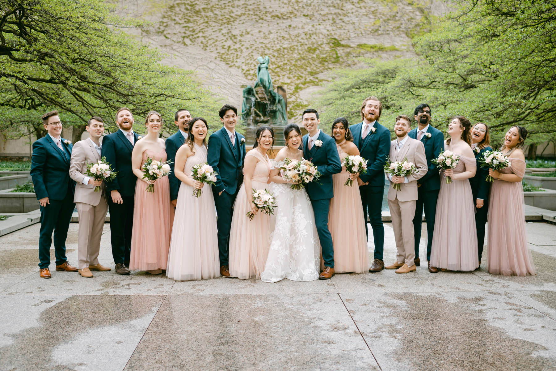 Bridal party poses for photos at Art Institute Gardens.