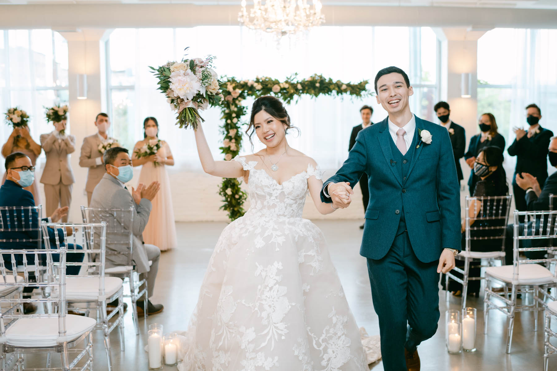Bride and groom exit ceremony at Room 1520.