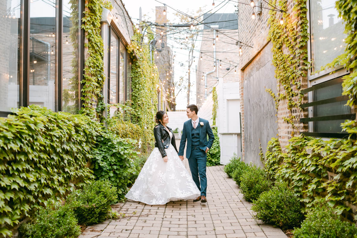 Wedding couple dance together at Room 1520.
