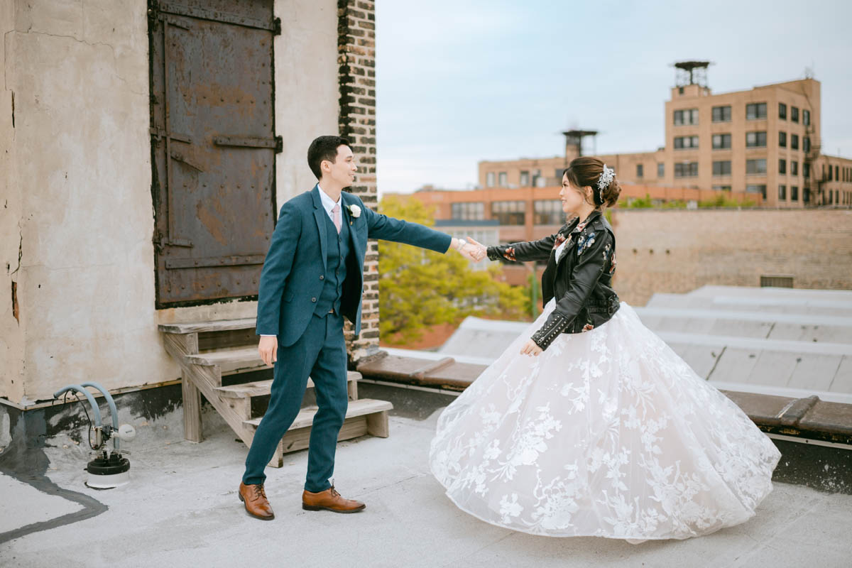 Wedding couple dance together at Room 1520.
