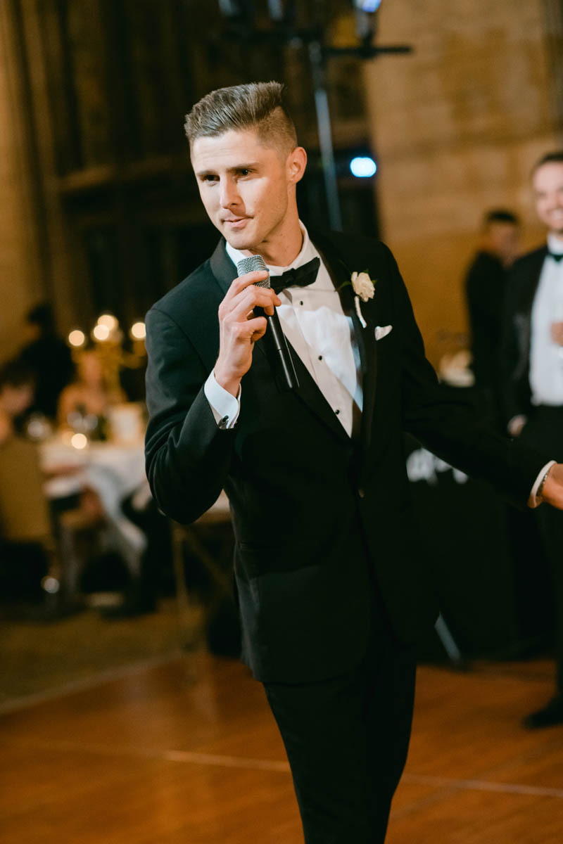 Groomsmen giving wedding toast.