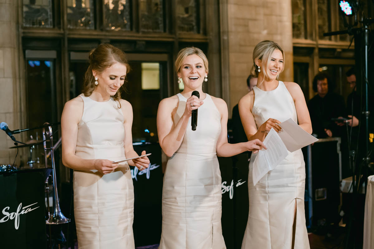 Bridesmaids giving wedding toast at University Club of Chicago.