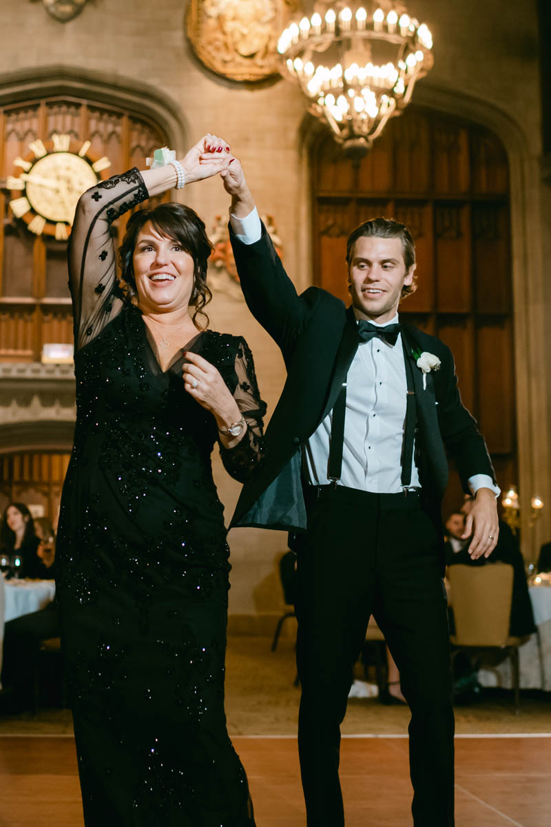 Mom dancing with groom.