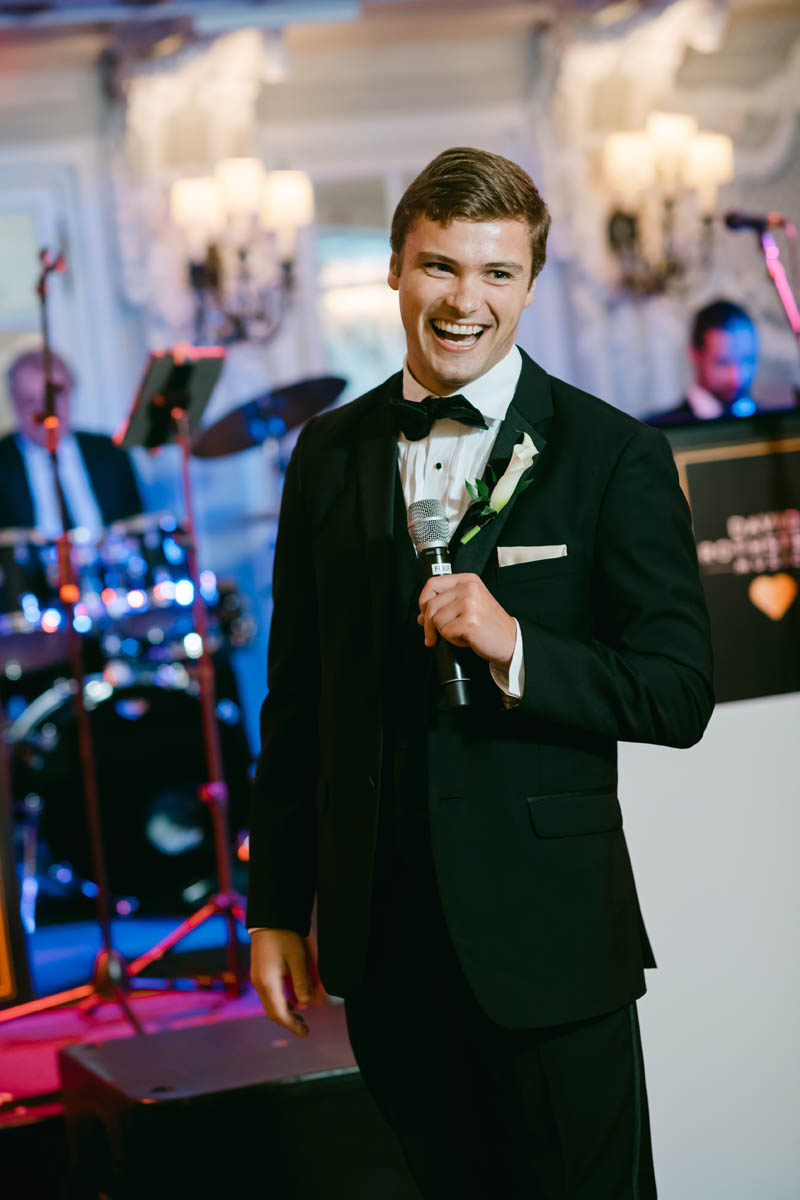 Best man giving a toast.