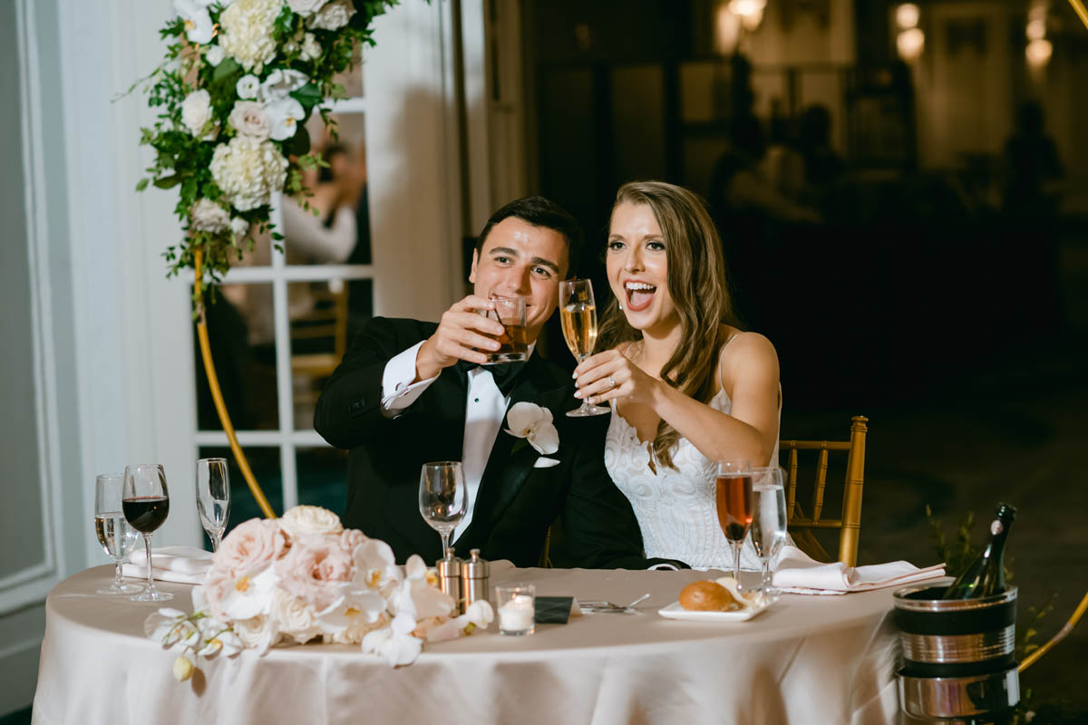 Bride and groom toasting.