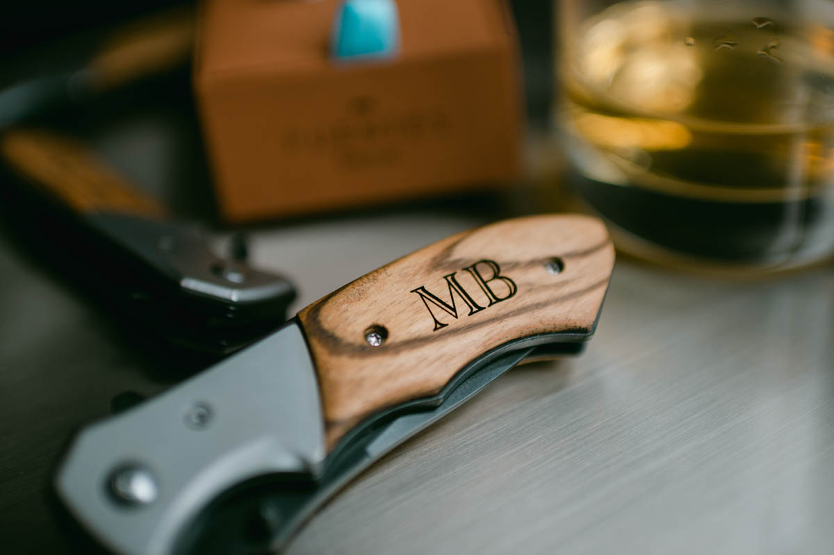 Groomsmen gift of engraved pocket knife.