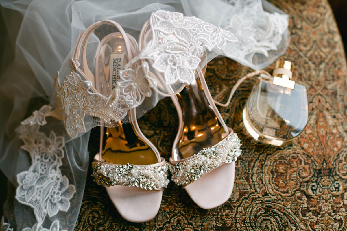Wedding shoes and perfume.