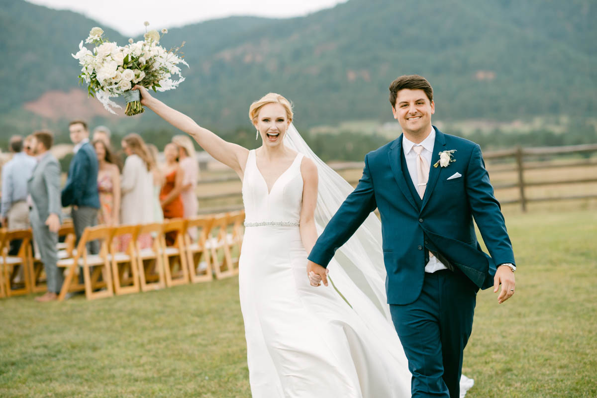 Happy wedding couple celebrate at Spruce Mountain Ranch.