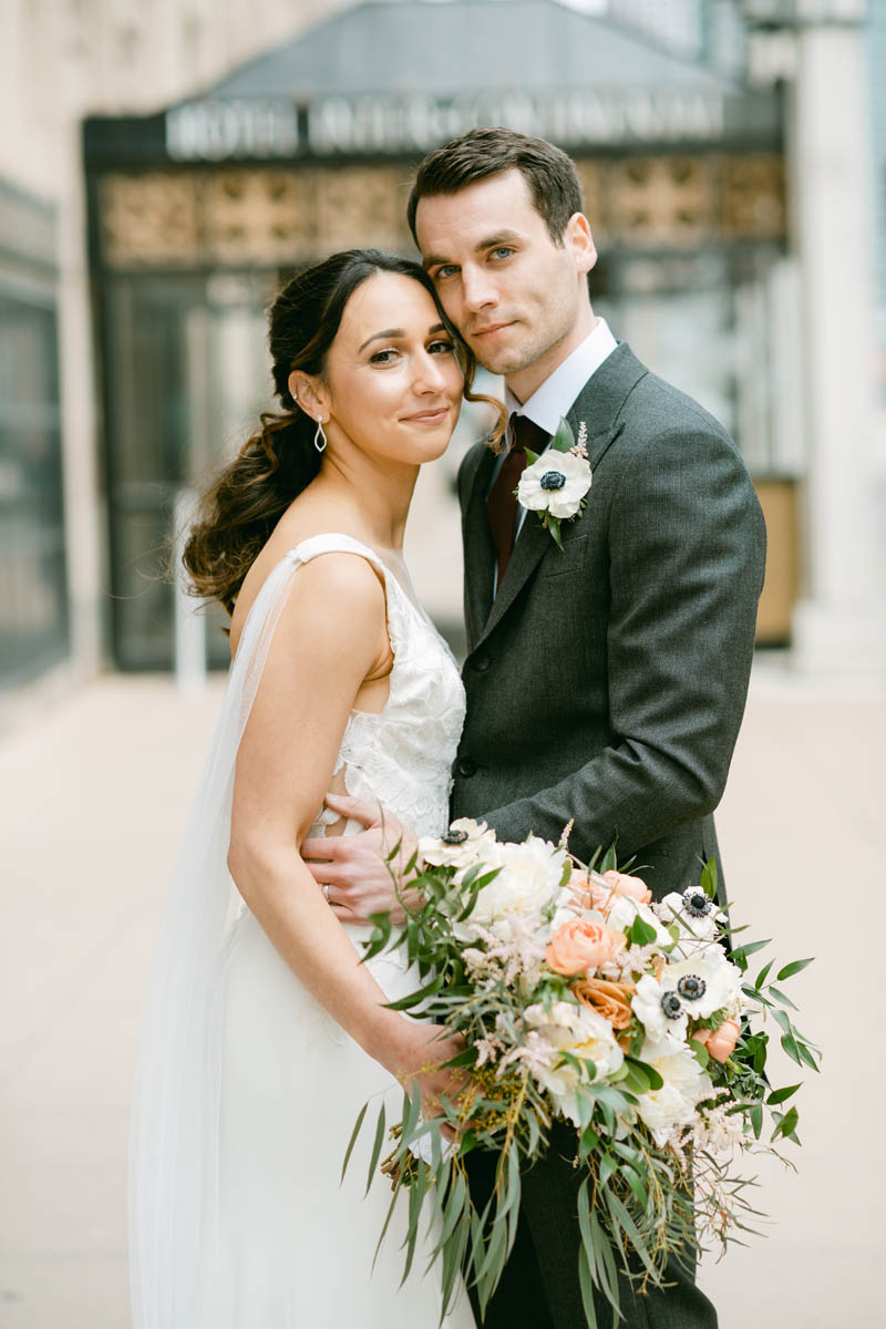 Bride and groom pose for photos at the Intercontinental Hotel wedding.