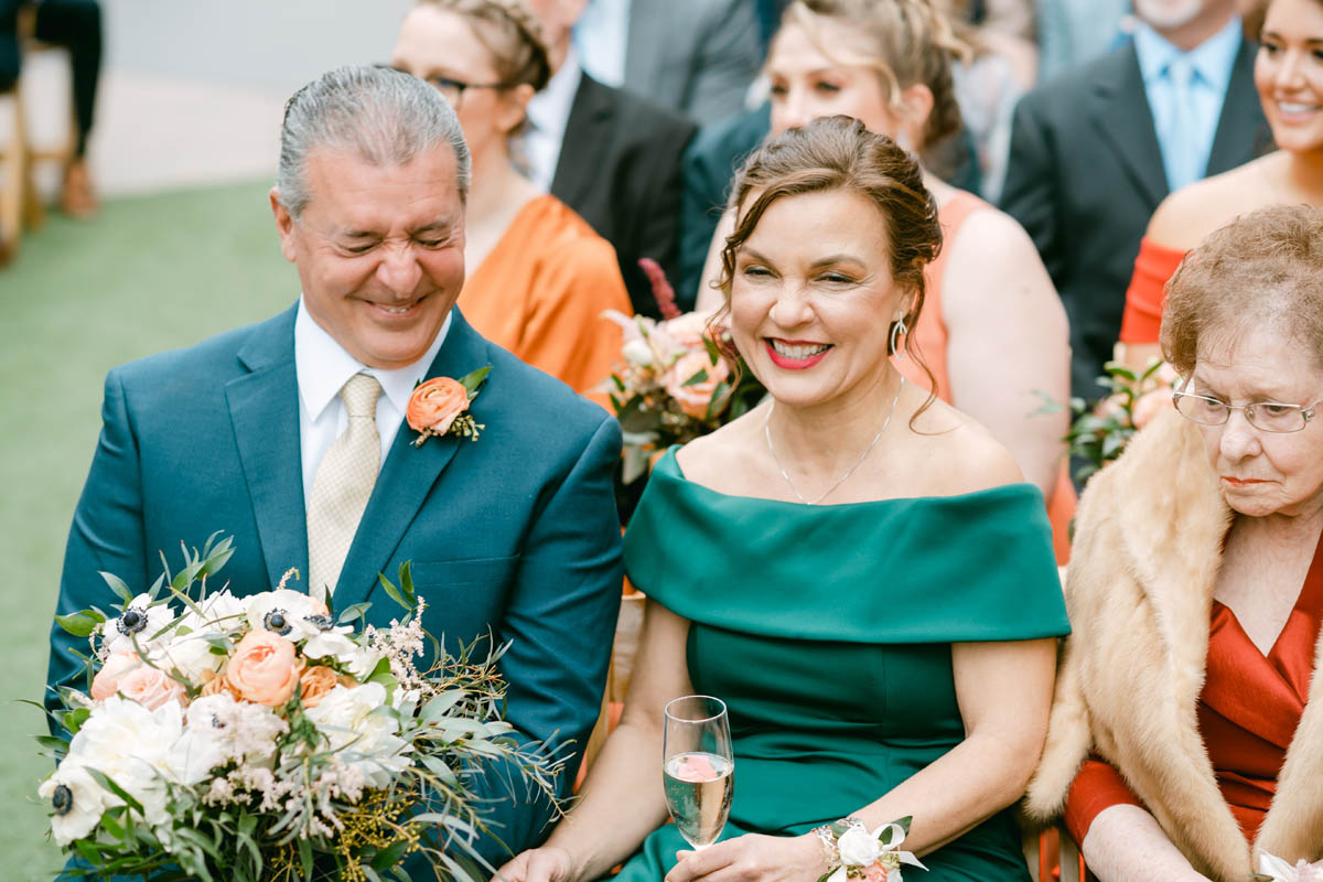 Bride's parents laughing.