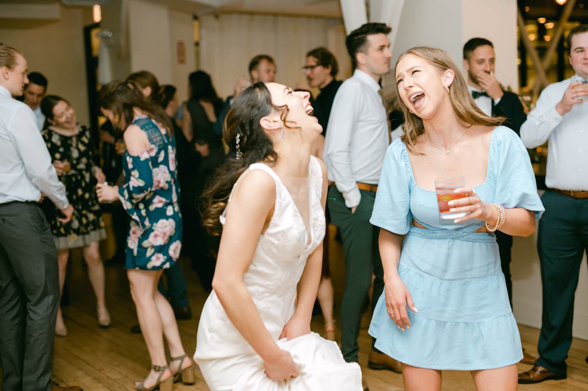 Bride dancing at wedding reception.