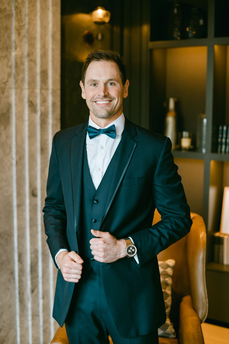 Groom posing in the vault