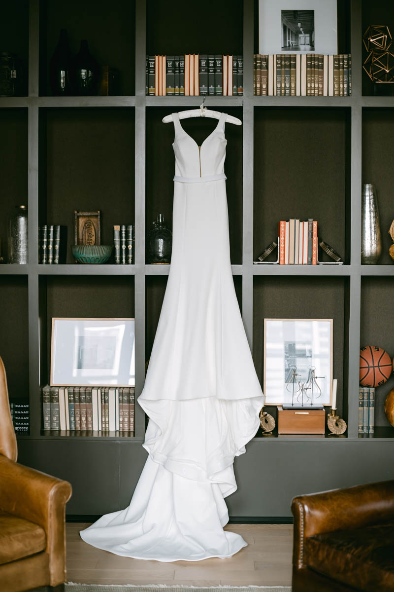 Wedding dress hanging at Old Post Office wedding.