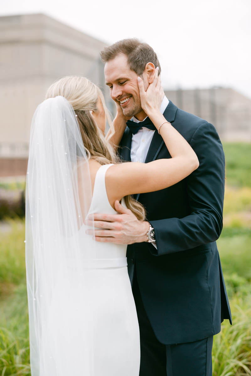 Groom seeing his bride for first look.