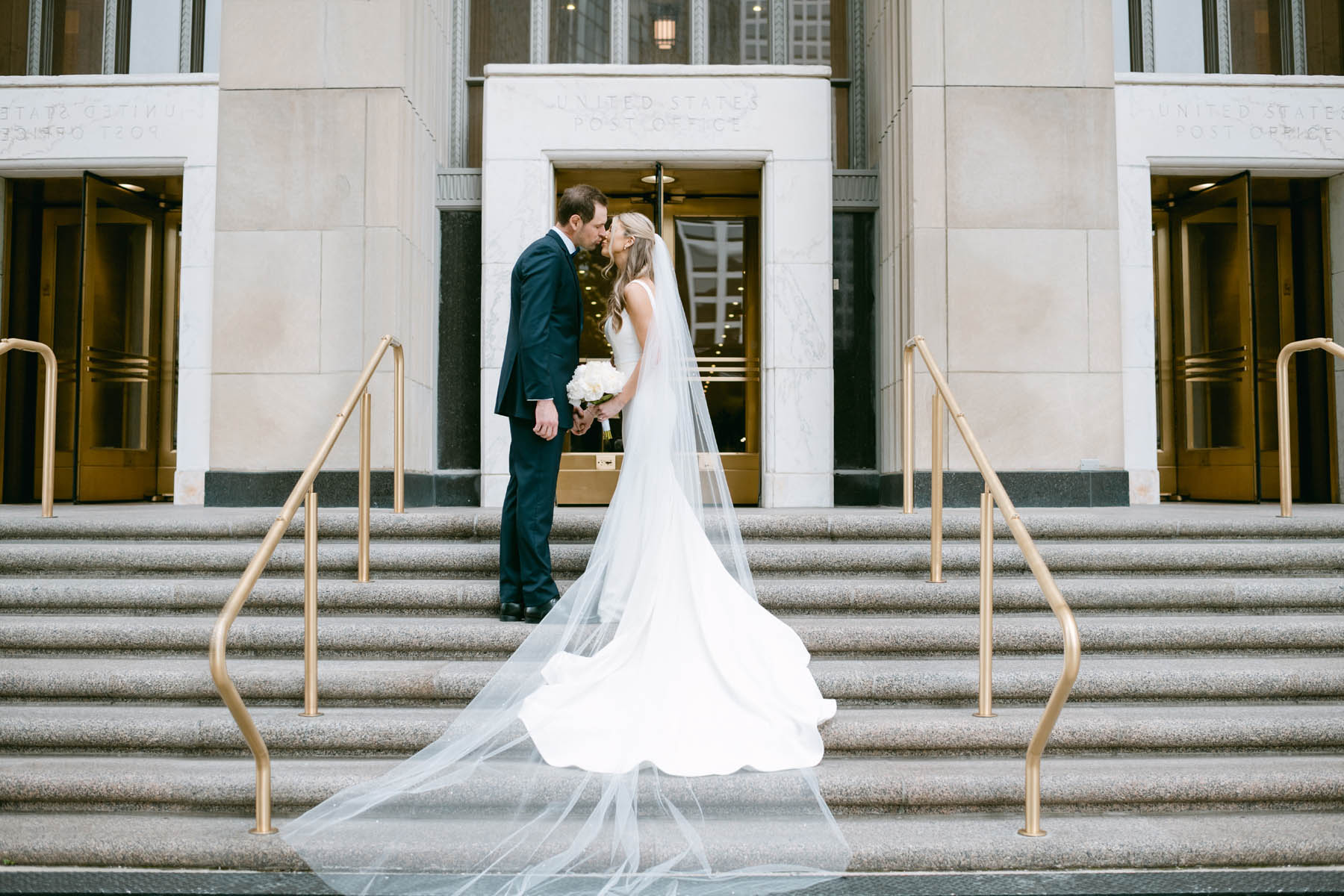 Couple posing at Old Post Office wedding