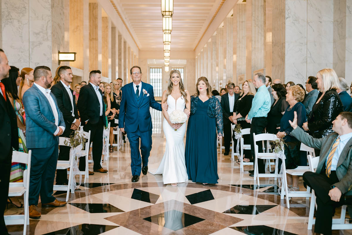Bride walks down the aisle at Old Post Office wedding