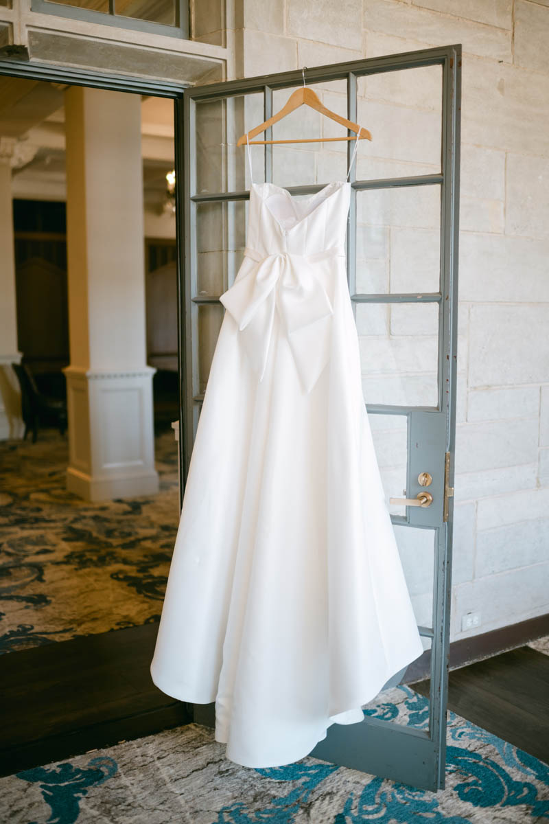 Wedding dress hanging at Michigan Shores Club wedding