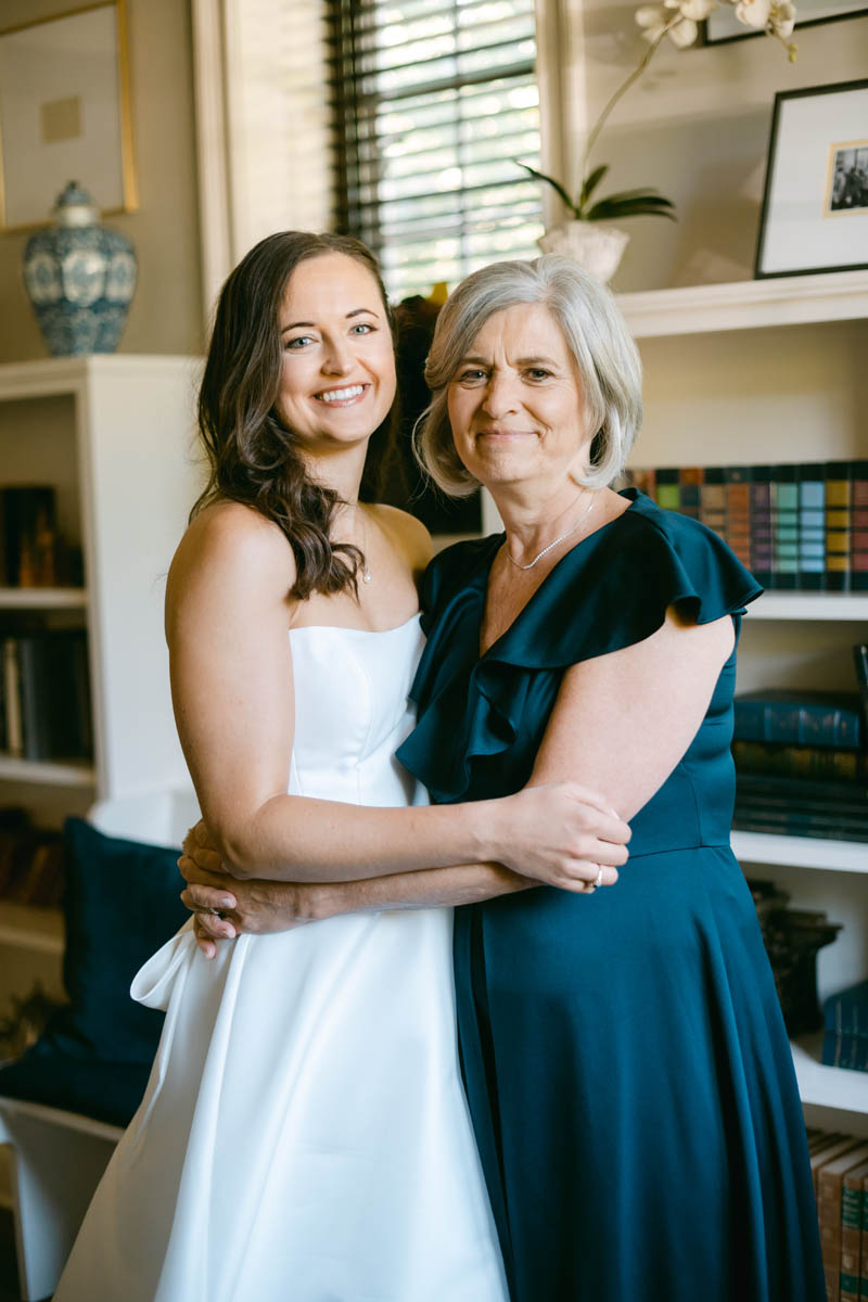 Bride hugging her mom