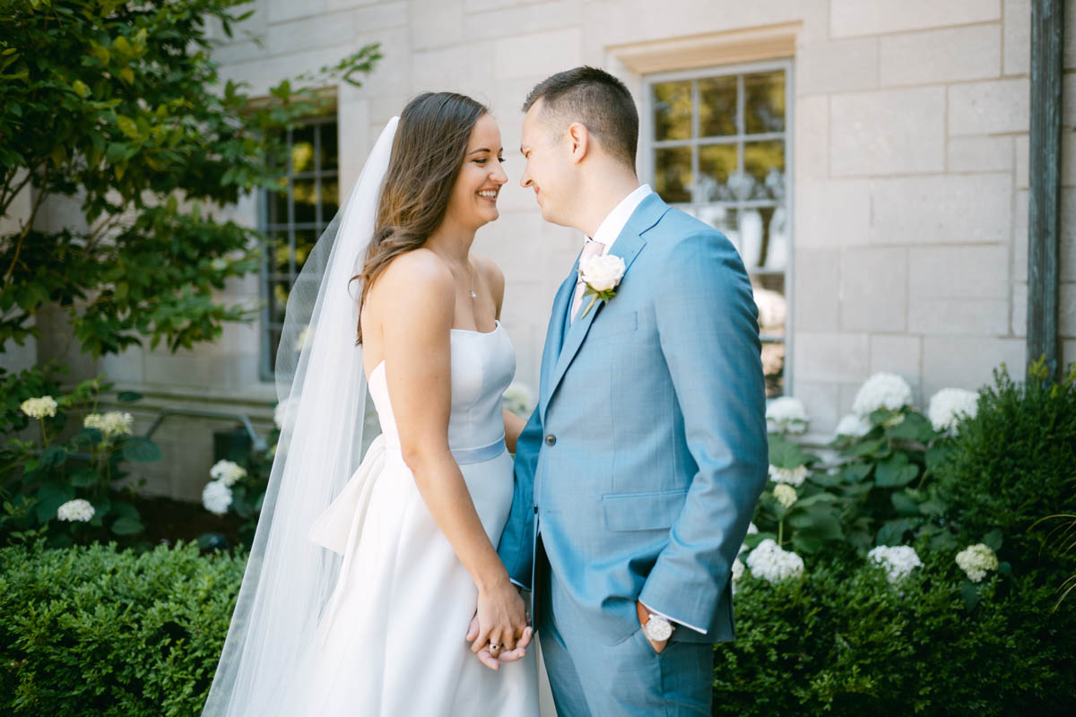 Bride and groom posing at Michigan Shores Club wedding