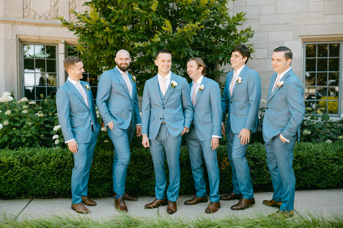 Groomsmen in blue suits at Michigan Shores Club wedding