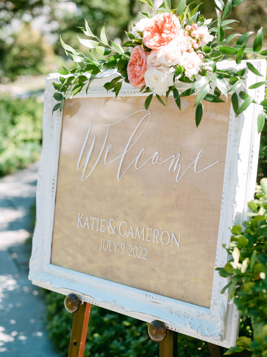 Floral wedding ceremony sign