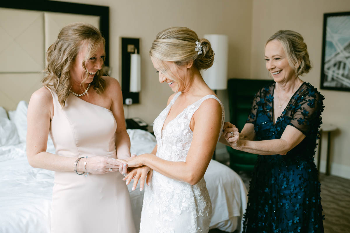 Bride getting ready with mom at JW Marriott wedding