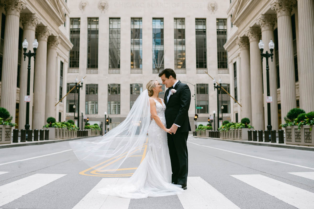 Bride and groom posing at Chicago Board of Trade wedding